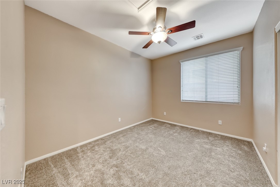 2764 Craigmillar Street Henderson, NV 89044 - Photo 19 of 24 Bedroom with ceiling fan and new carpet.