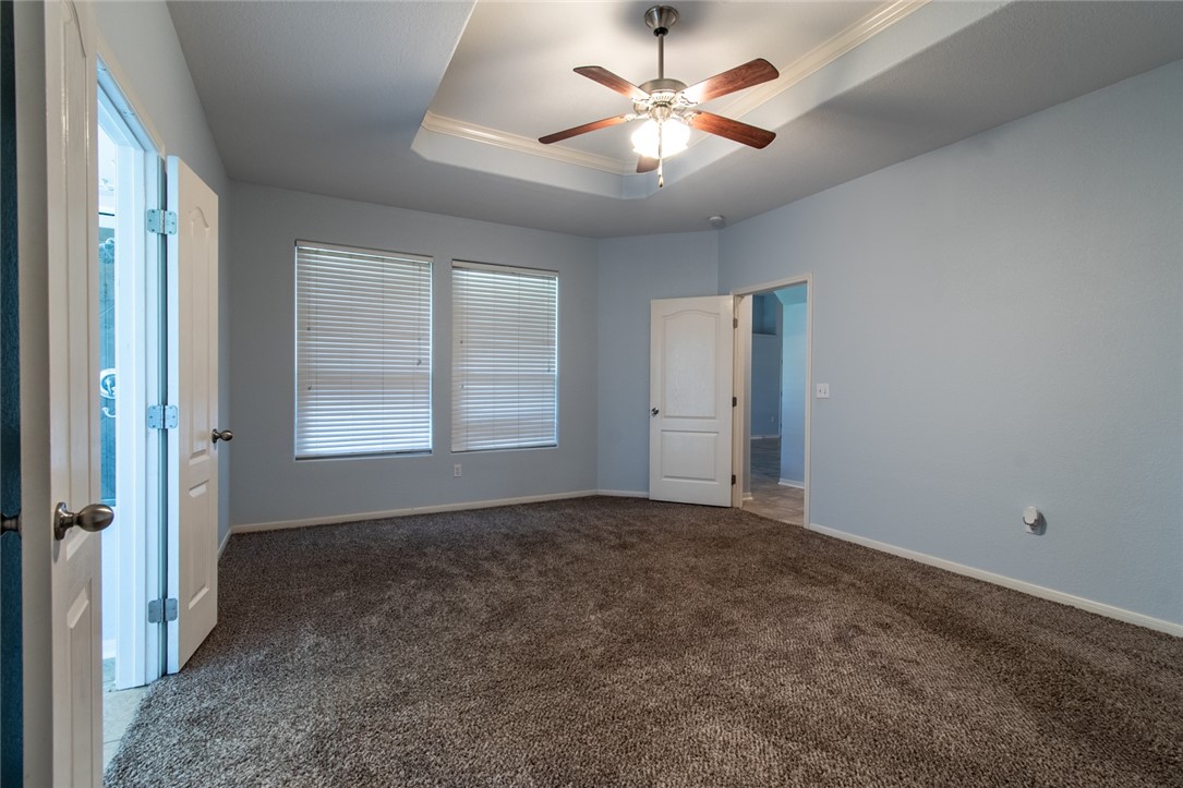 316 San Jose Street Portland, TX 78374 - Photo 15 of 35 an empty room with windows and fan