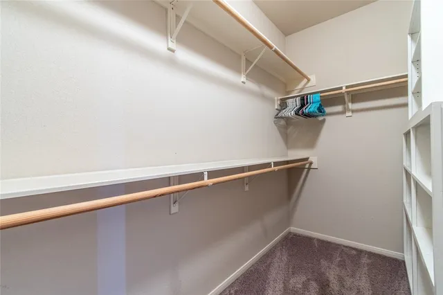 an empty room with a bathroom