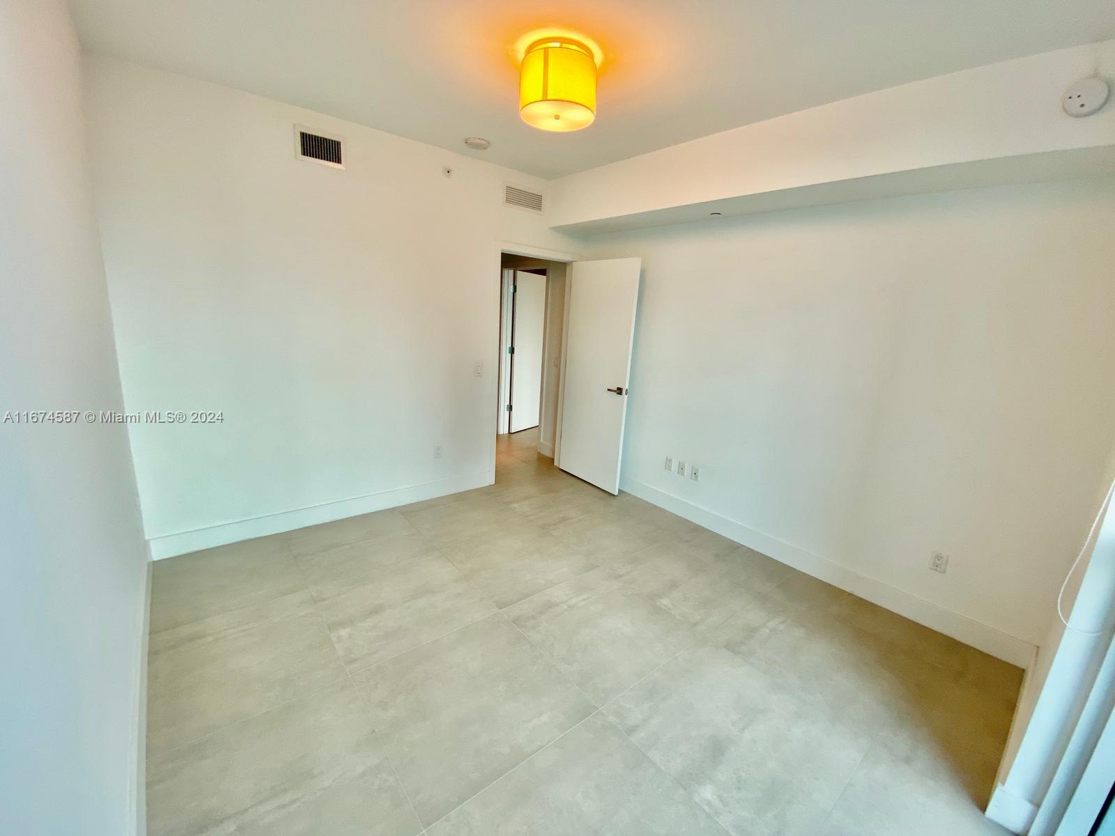 1080 Brickell Avenue, Unit 3107 Miami, FL 33131 - Photo 12 of 19 a view of a garage