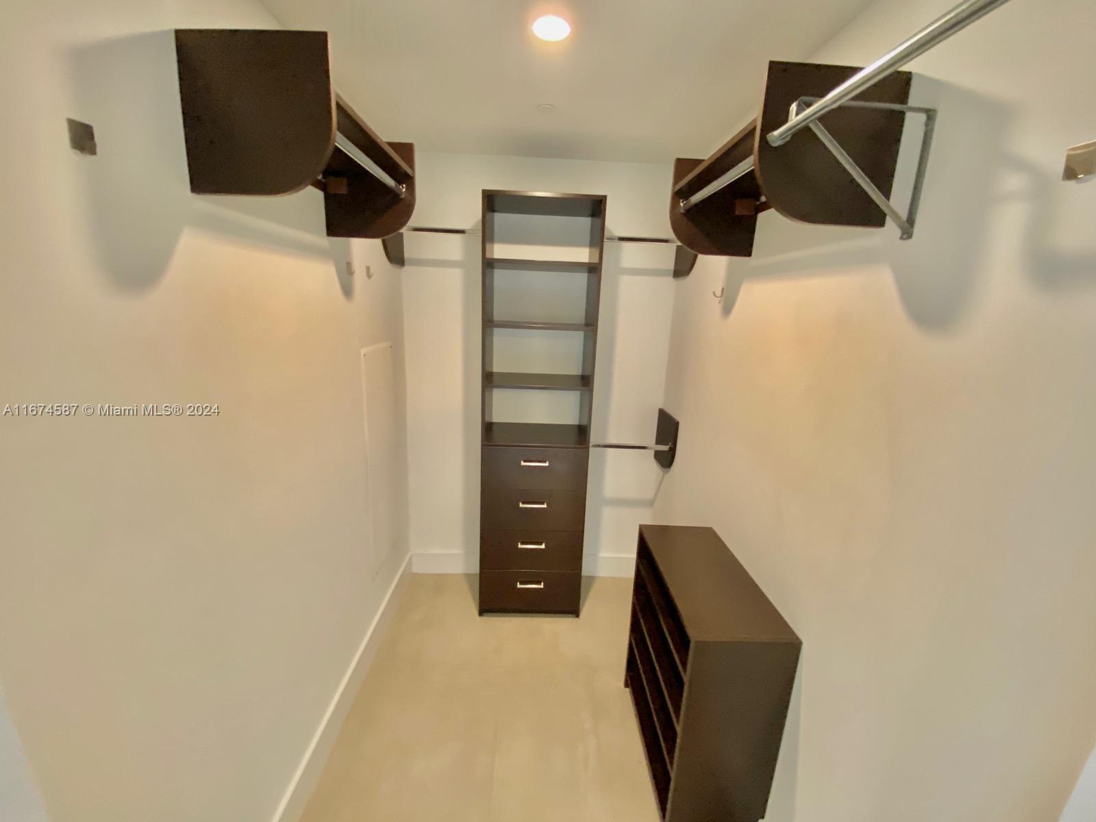 1080 Brickell Avenue, Unit 3107 Miami, FL 33131 - Photo 13 of 19 a view of walk in closet