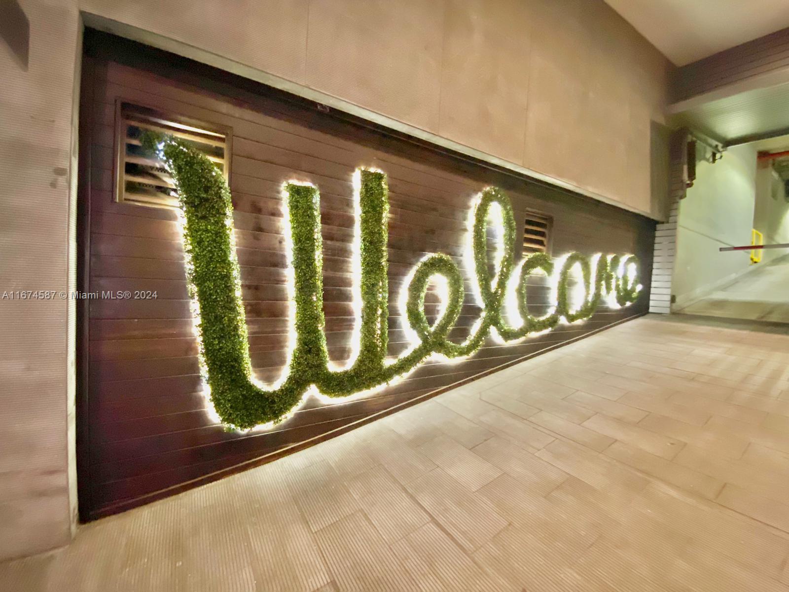 1080 Brickell Avenue, Unit 3107 Miami, FL 33131 - Photo 17 of 19 a sign broad on the wall