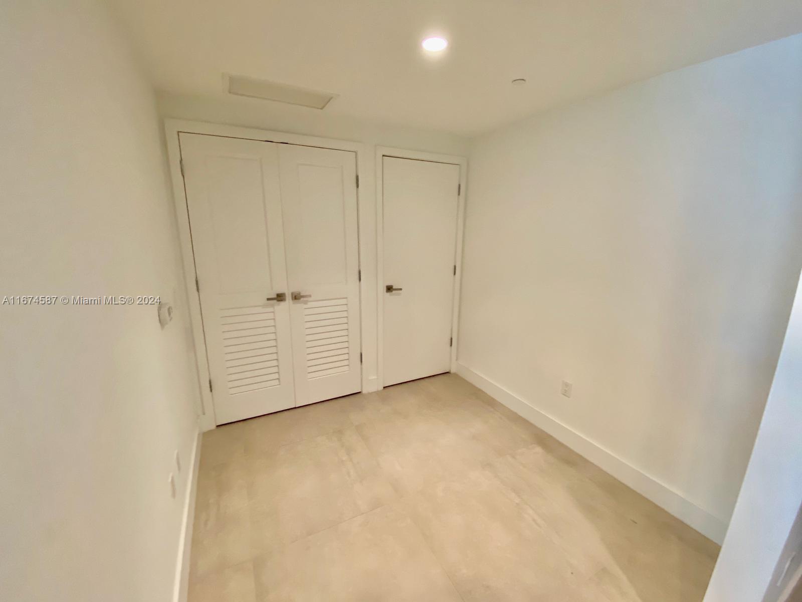 1080 Brickell Avenue, Unit 3107 Miami, FL 33131 - Photo 6 of 19 a view of an empty room