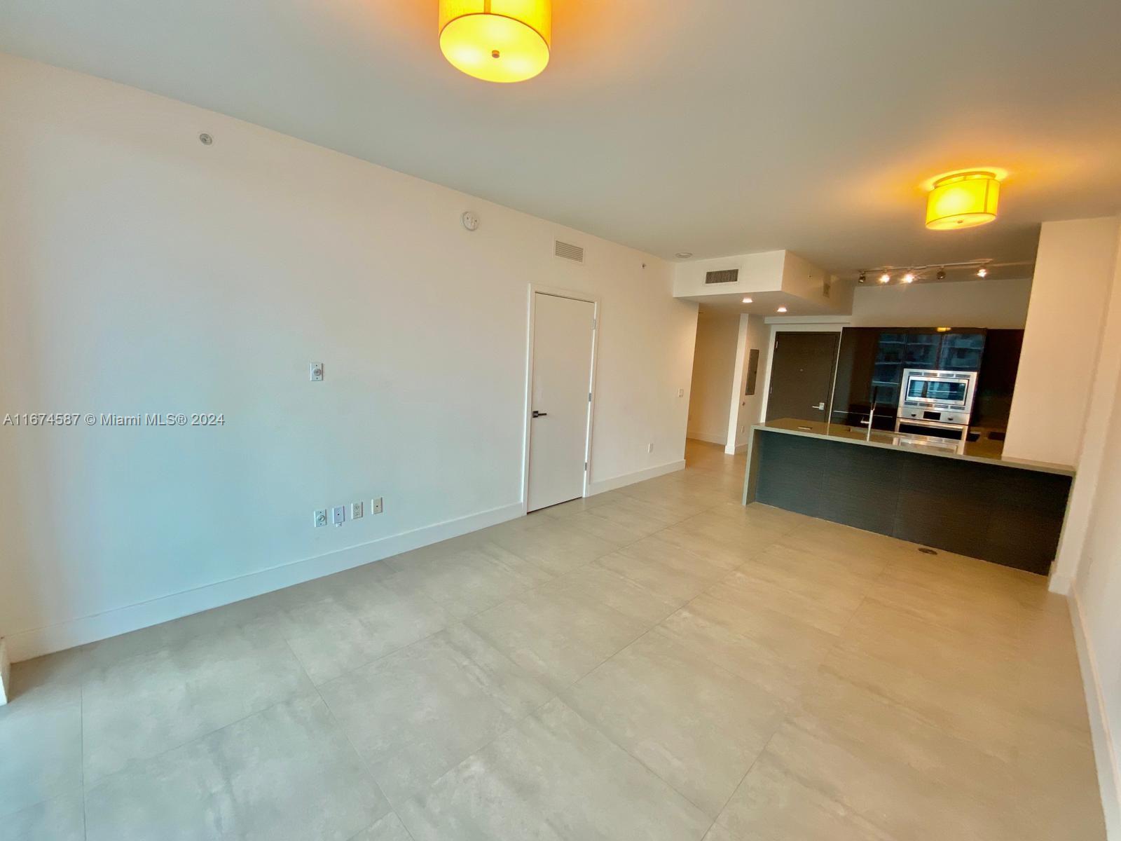 1080 Brickell Avenue, Unit 3107 Miami, FL 33131 - Photo 9 of 19 a view of a kitchen with a sink