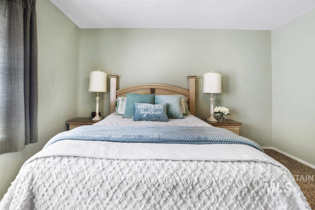 3985 North 2300 E Road Filer, ID 83328 - Photo 14 of 35 Bedroom with carpet flooring and baseboards