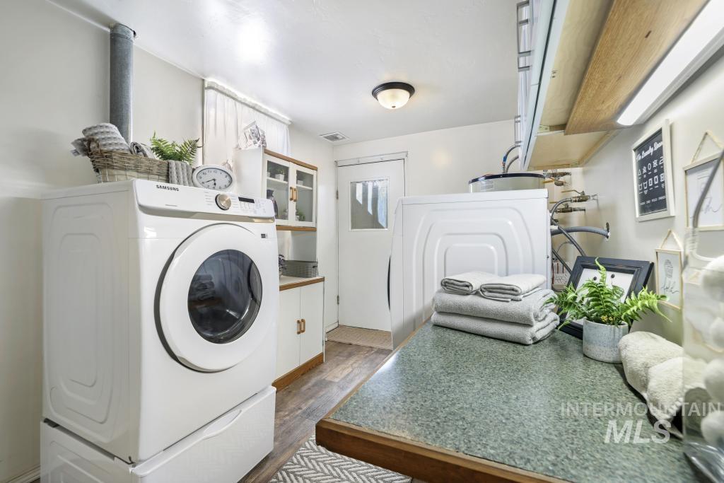 3985 North 2300 E Road Filer, ID 83328 - Photo 22 of 35 Laundry area with dark wood-type flooring