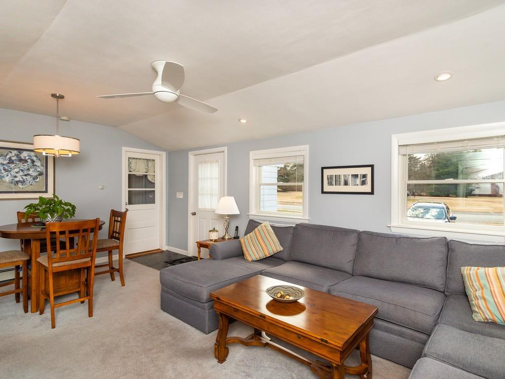 48 MacDonald Circle Walpole, MA 02081 - Photo 27 of 41 a living room with furniture and a window