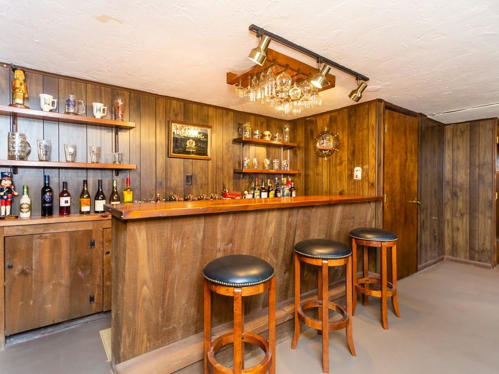 48 MacDonald Circle Walpole, MA 02081 - Photo 33 of 41 a view of a dining room with furniture and chandelier