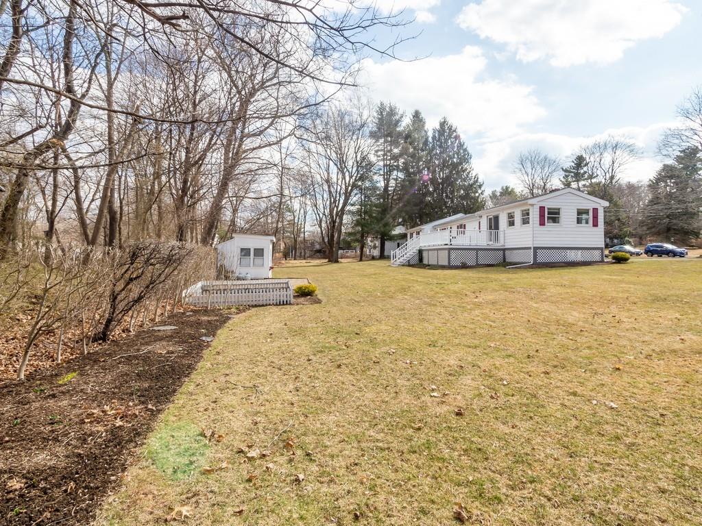 48 MacDonald Circle Walpole, MA 02081 - Photo 36 of 41 a view of a lake with houses
