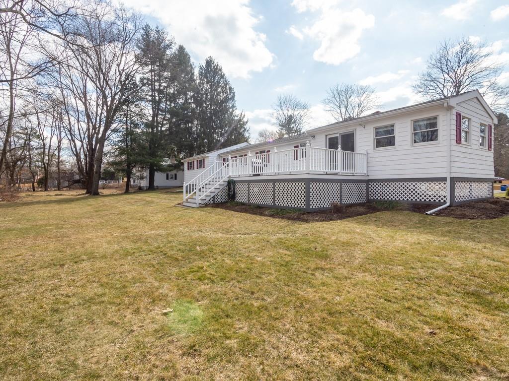 48 MacDonald Circle Walpole, MA 02081 - Photo 37 of 41 a large white house with a large pool