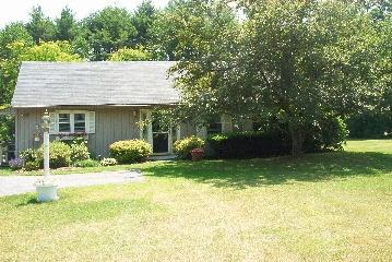 79 Salisbury Road Sheffield, MA 01257 - Photo 1 of 1 a view of a house with backyard and sitting area
