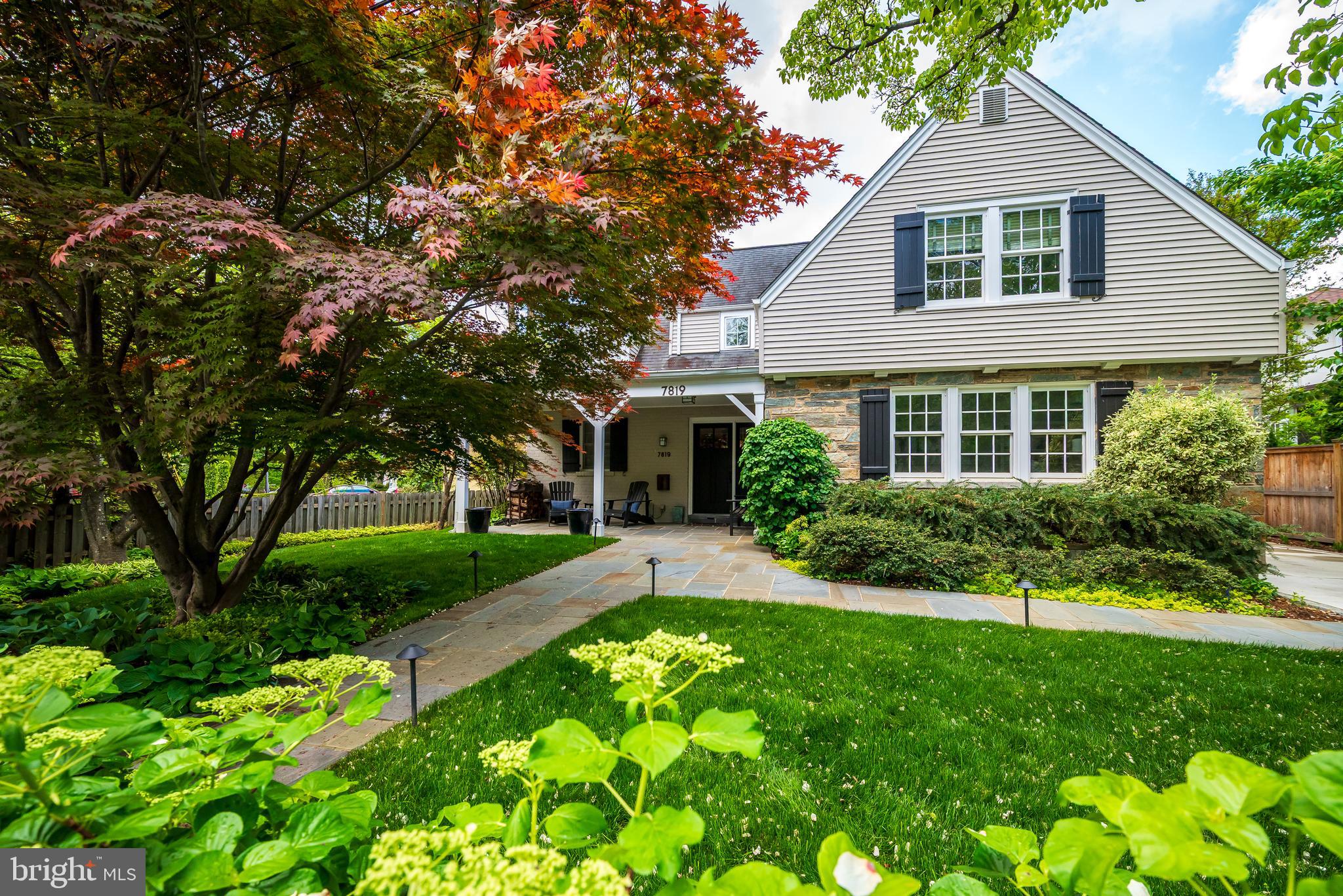 7819 Glenbrook Road Bethesda, MD 20814 - Photo 1 of 1 a front view of house with yard and green space