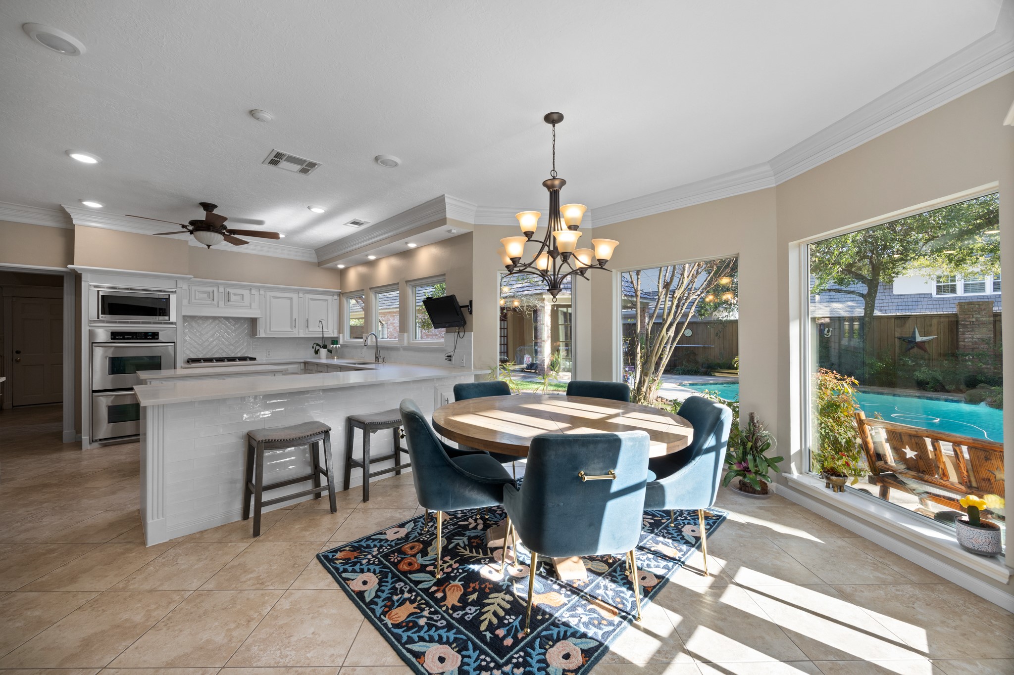 8807 Chelmsford Lane Spring, TX 77379 - Photo 14 of 50 Just off of the main living room you are welcomed into the kitchen through the breakfast area that overlooks the pool and back yard.
