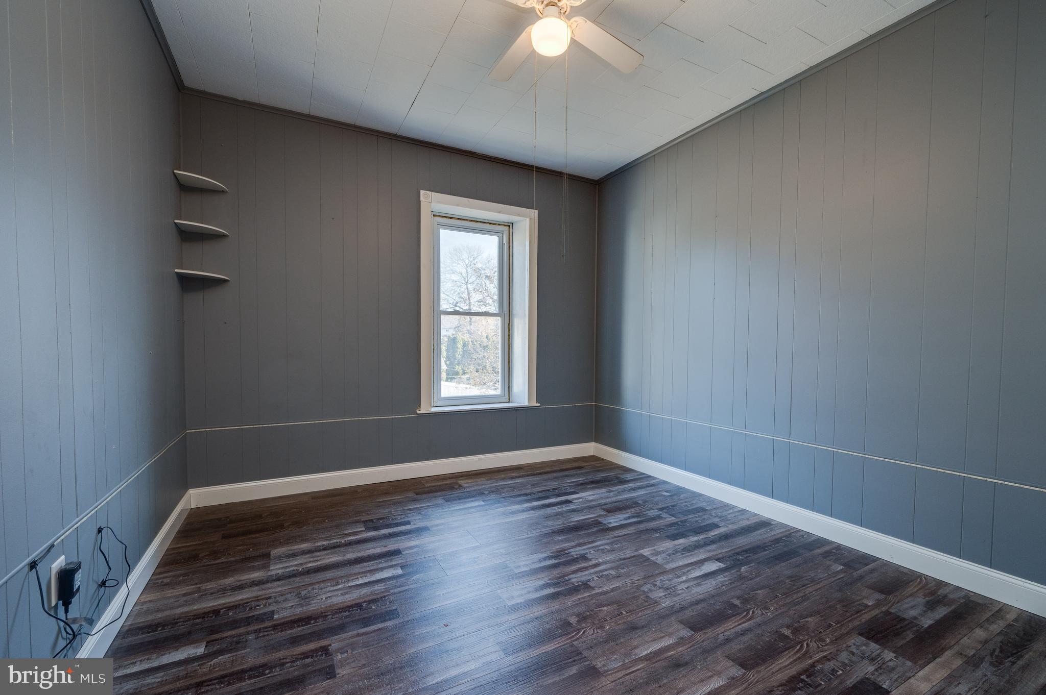 800 Mount Laurel Road Temple, PA 19560 - Photo 28 of 42 wooden floor in an empty room with a window