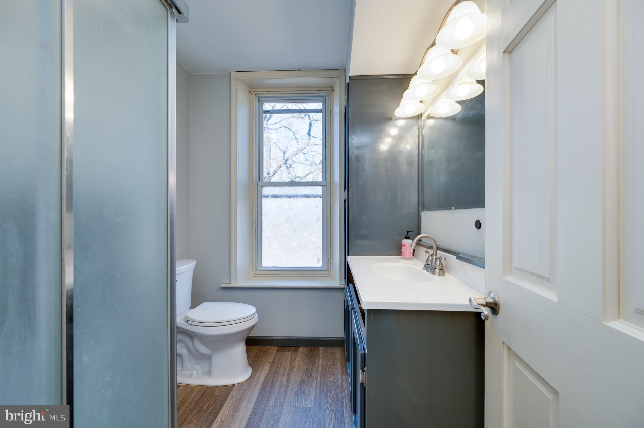 800 Mount Laurel Road Temple, PA 19560 - Photo 30 of 42 a bathroom with a sink toilet and a mirror