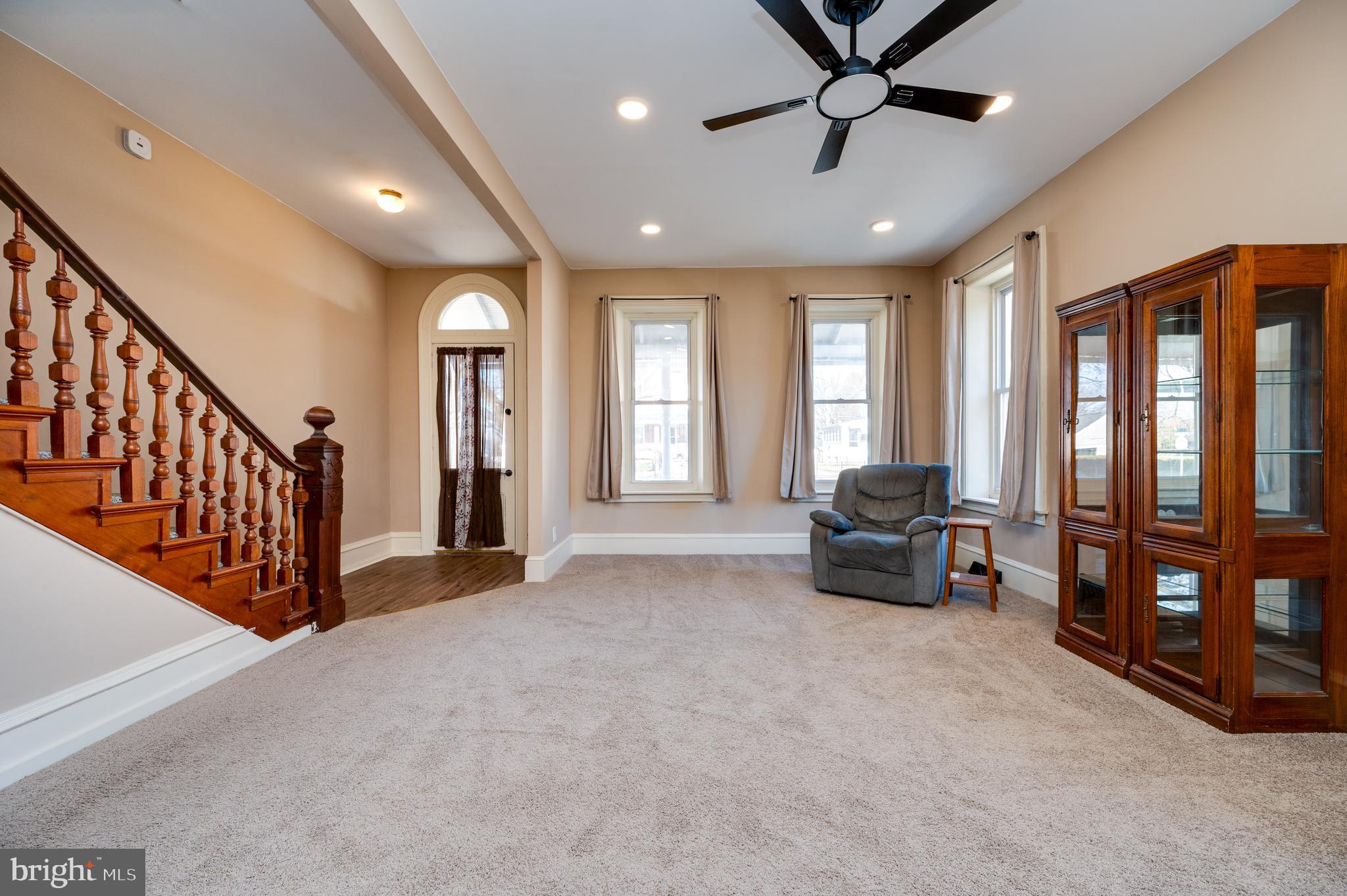 800 Mount Laurel Road Temple, PA 19560 - Photo 7 of 42 a living room with furniture and a ceiling fan