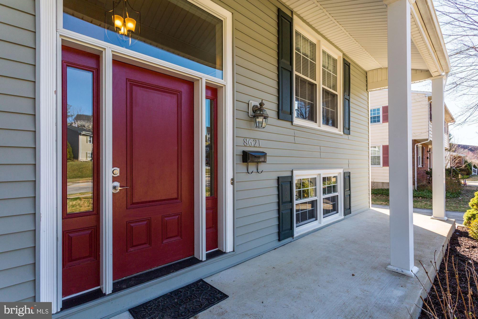 8621 Valleyfield Road Lutherville-Timonium, MD 21093 - Photo 2 of 29 Classic black shutters and red door