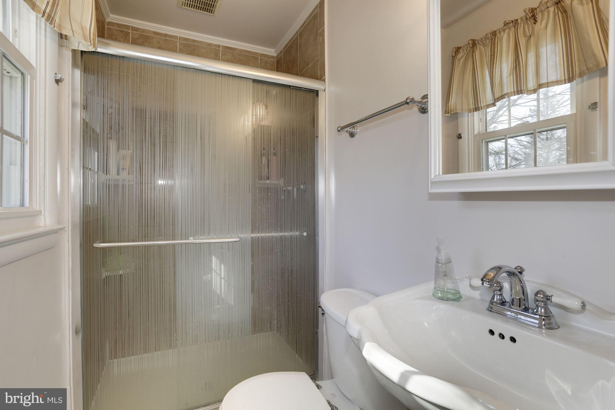 8621 Valleyfield Road Lutherville-Timonium, MD 21093 - Photo 17 of 29 Remodeled bath w/walk-in shower (rainfall glass)