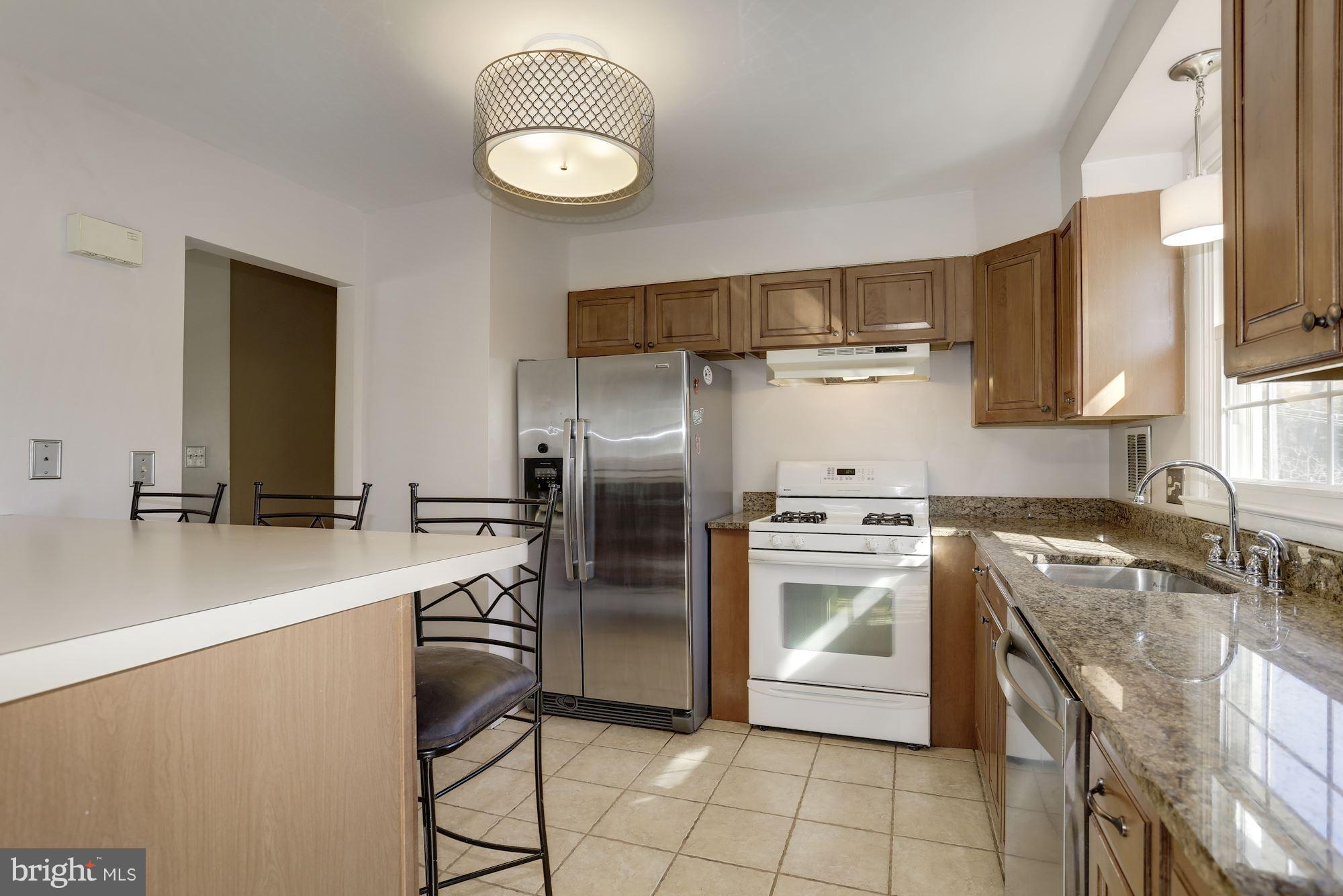 8621 Valleyfield Road Lutherville-Timonium, MD 21093 - Photo 9 of 29 Kitchen renovation with wall removed to dinrm