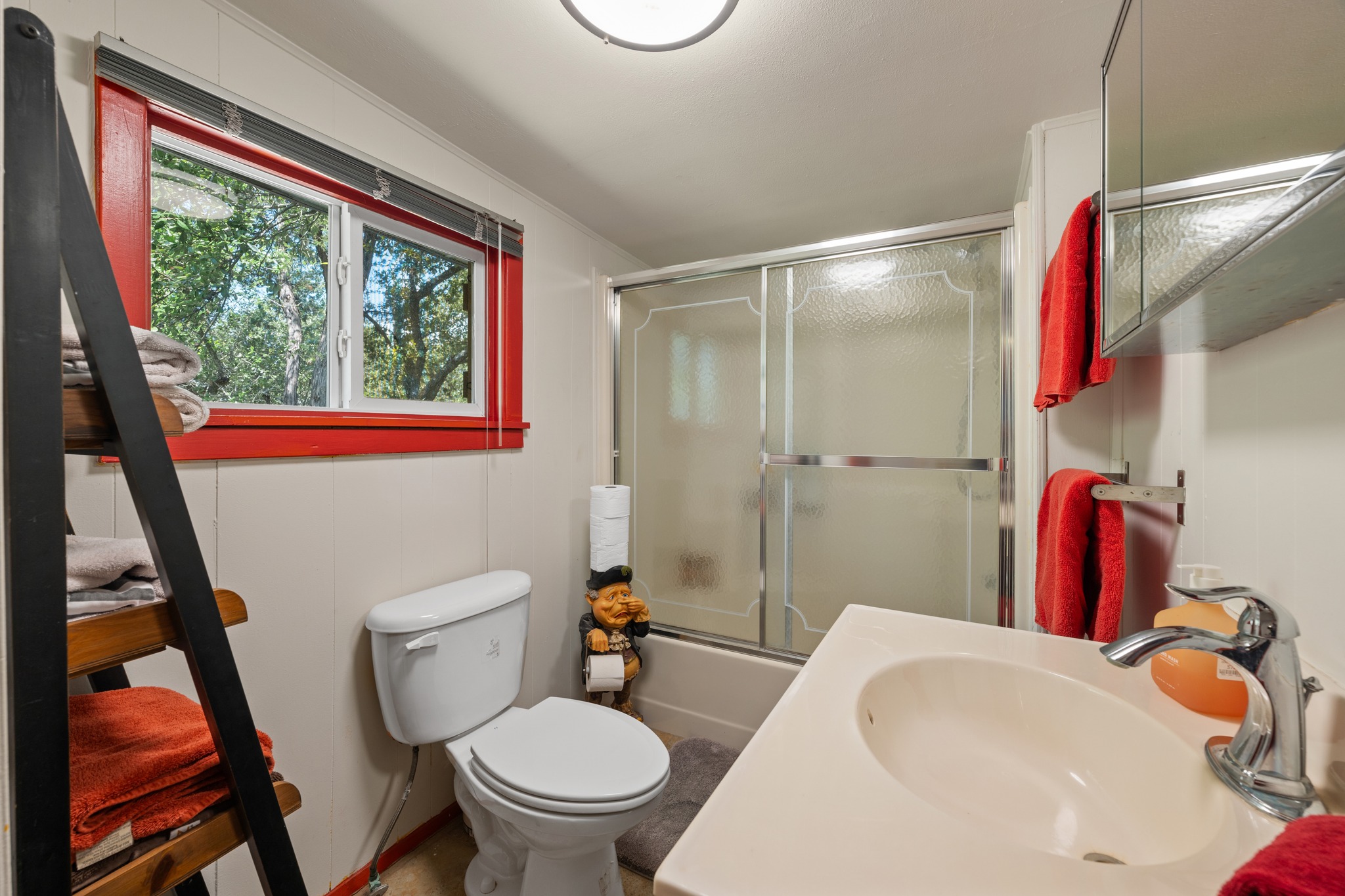 12932 Nutty Brown Road Austin, TX 78737 - Photo 19 of 40 The Cabin - Well-appointed bathroom with clean, timeless finishes.