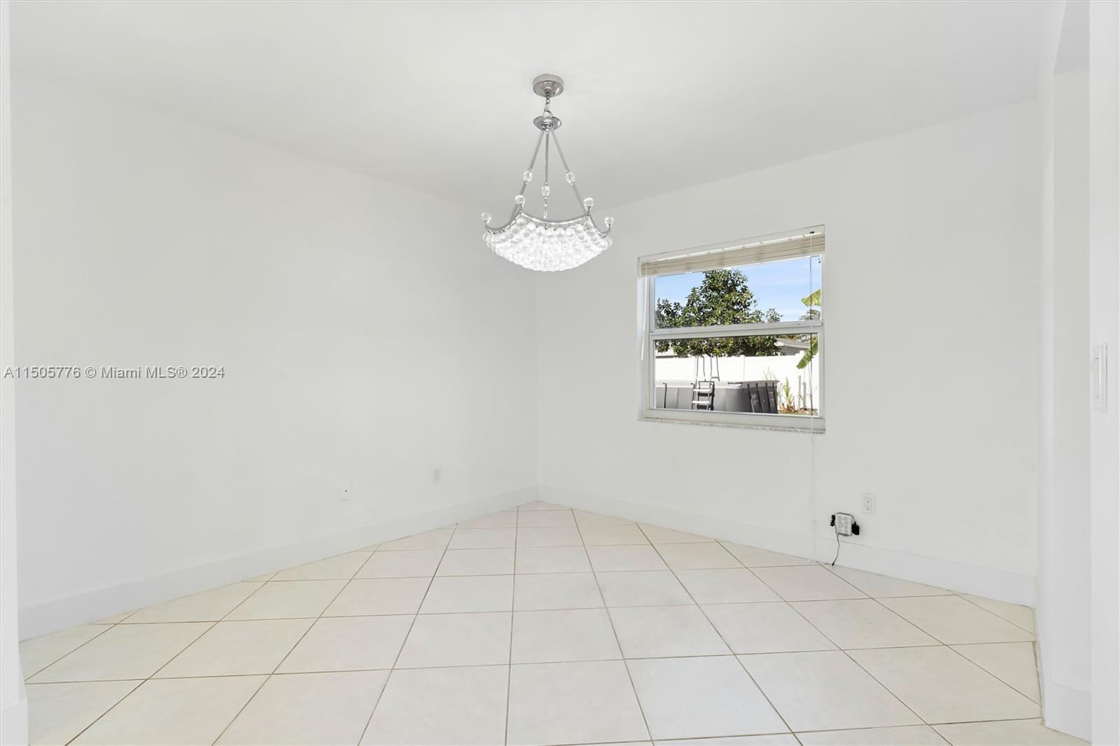 11126 Delta Circle Boca Raton, FL 33428 - Photo 7 of 22 a view of a small space with window