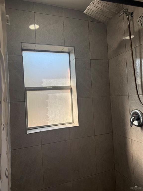 708 North 6th Street McAllen, TX 78501 - Photo 17 of 27 Full bathroom with tiled shower