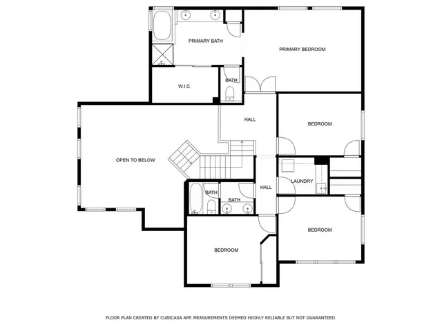 a picture of a room with a white wall and a painting