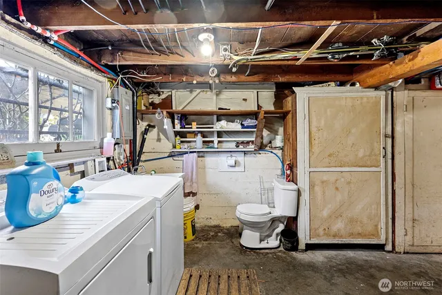 a view of house with backyard and outdoor seating