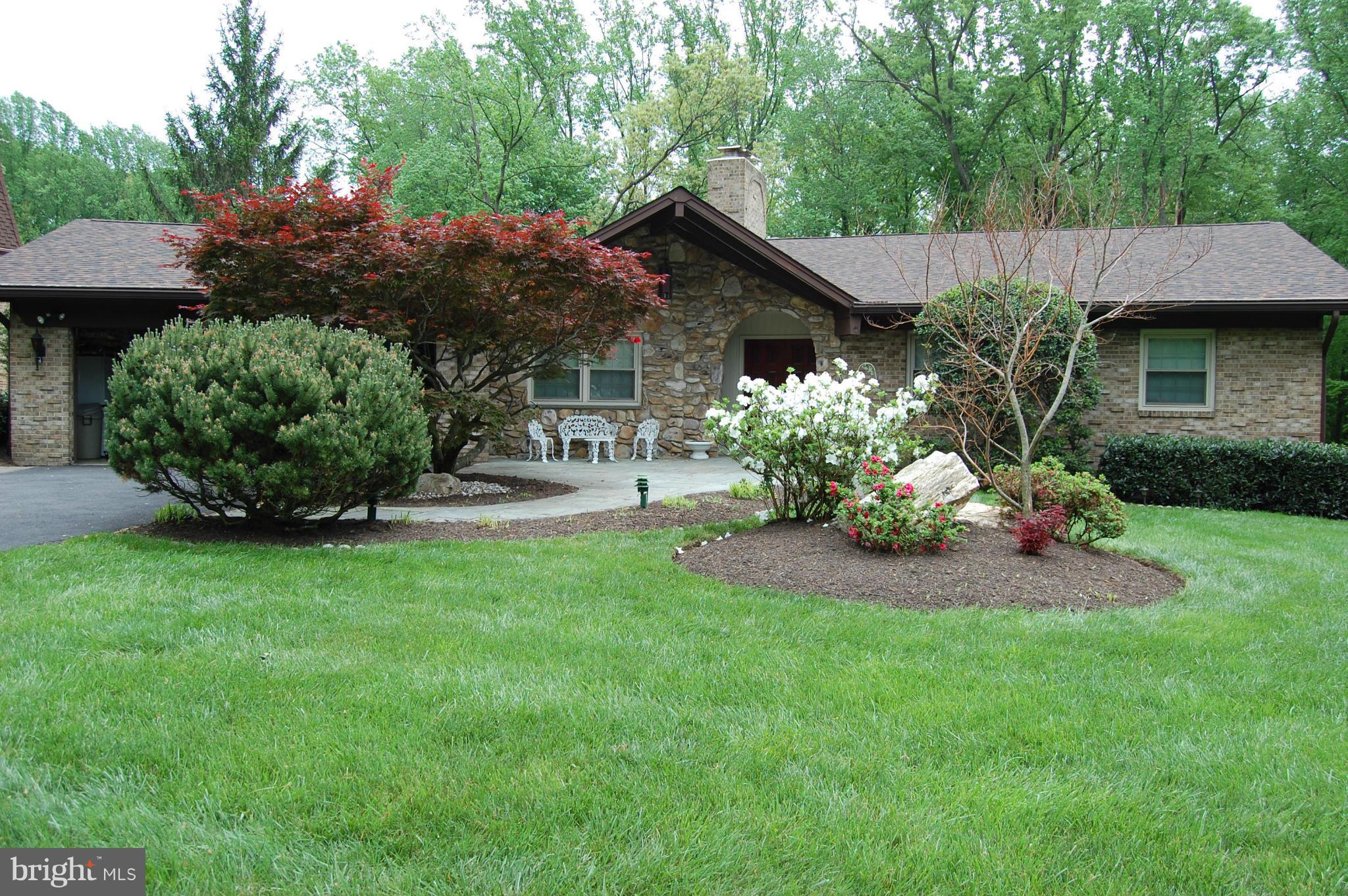 2209 Parallel Lane Silver Spring, MD 20904 - Photo 1 of 30 a front view of a house with garden