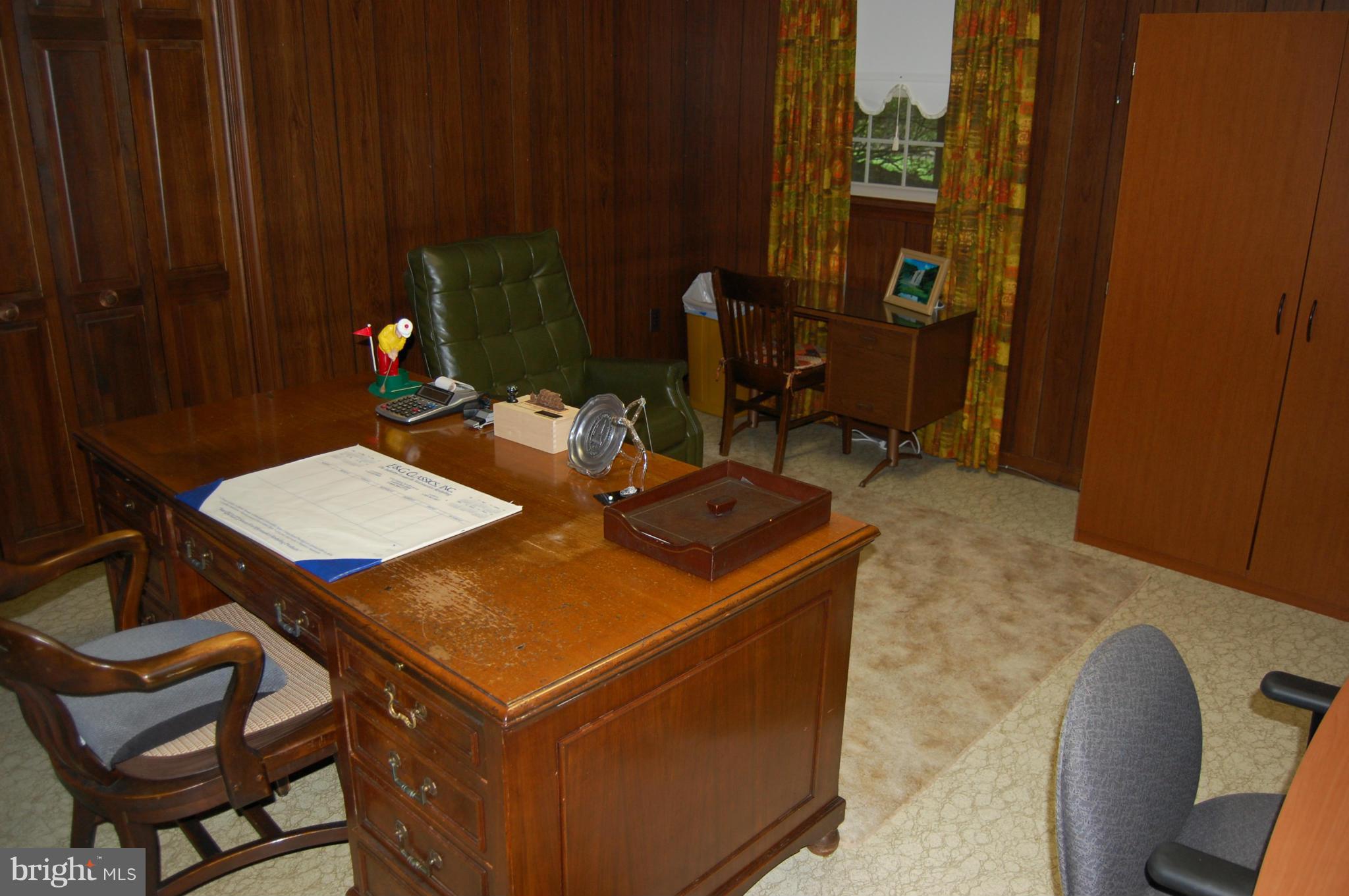 2209 Parallel Lane Silver Spring, MD 20904 - Photo 20 of 30 a room with table chairs and appliances
