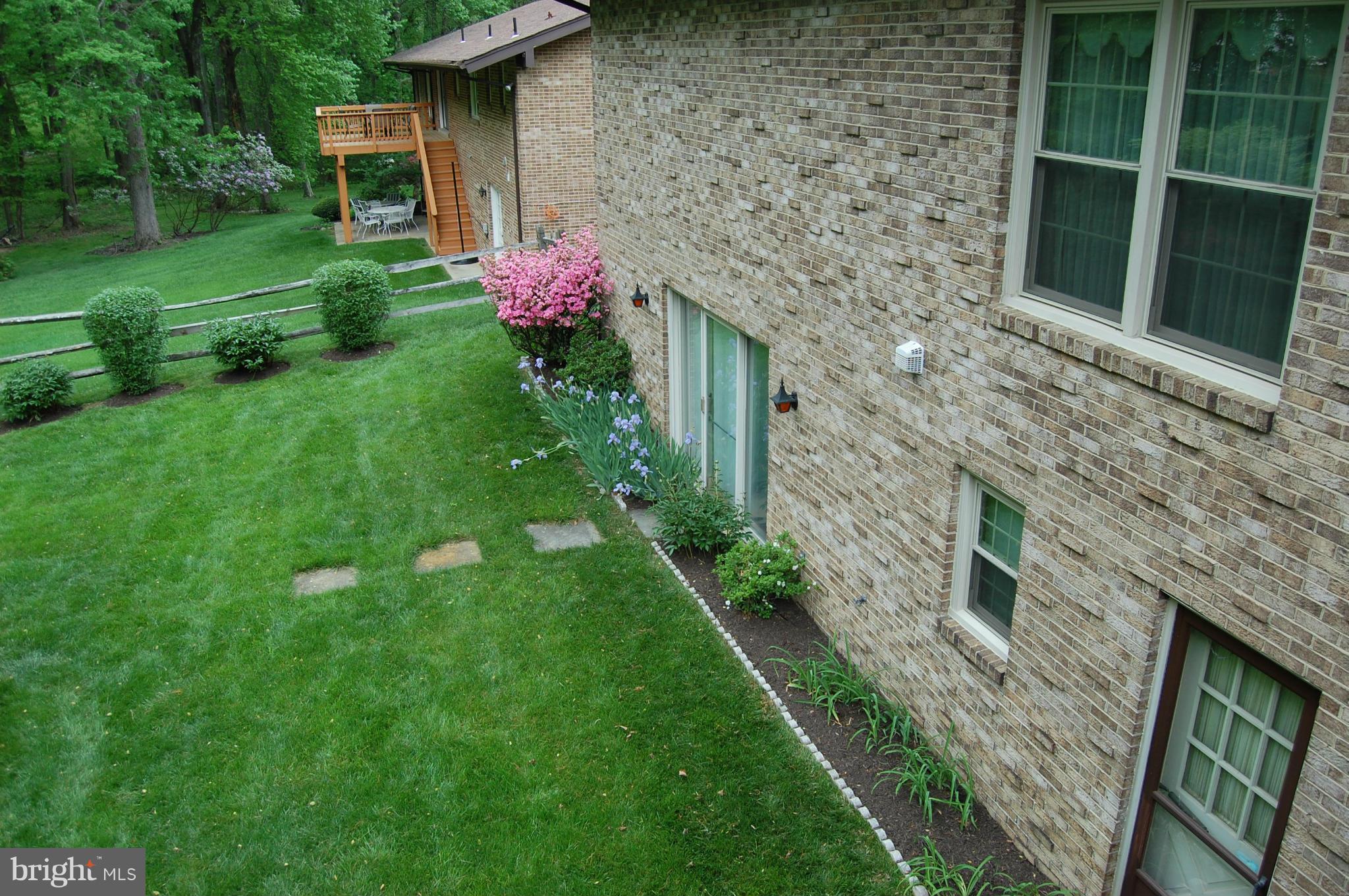 2209 Parallel Lane Silver Spring, MD 20904 - Photo 27 of 30 a backyard of a house with lots of green space