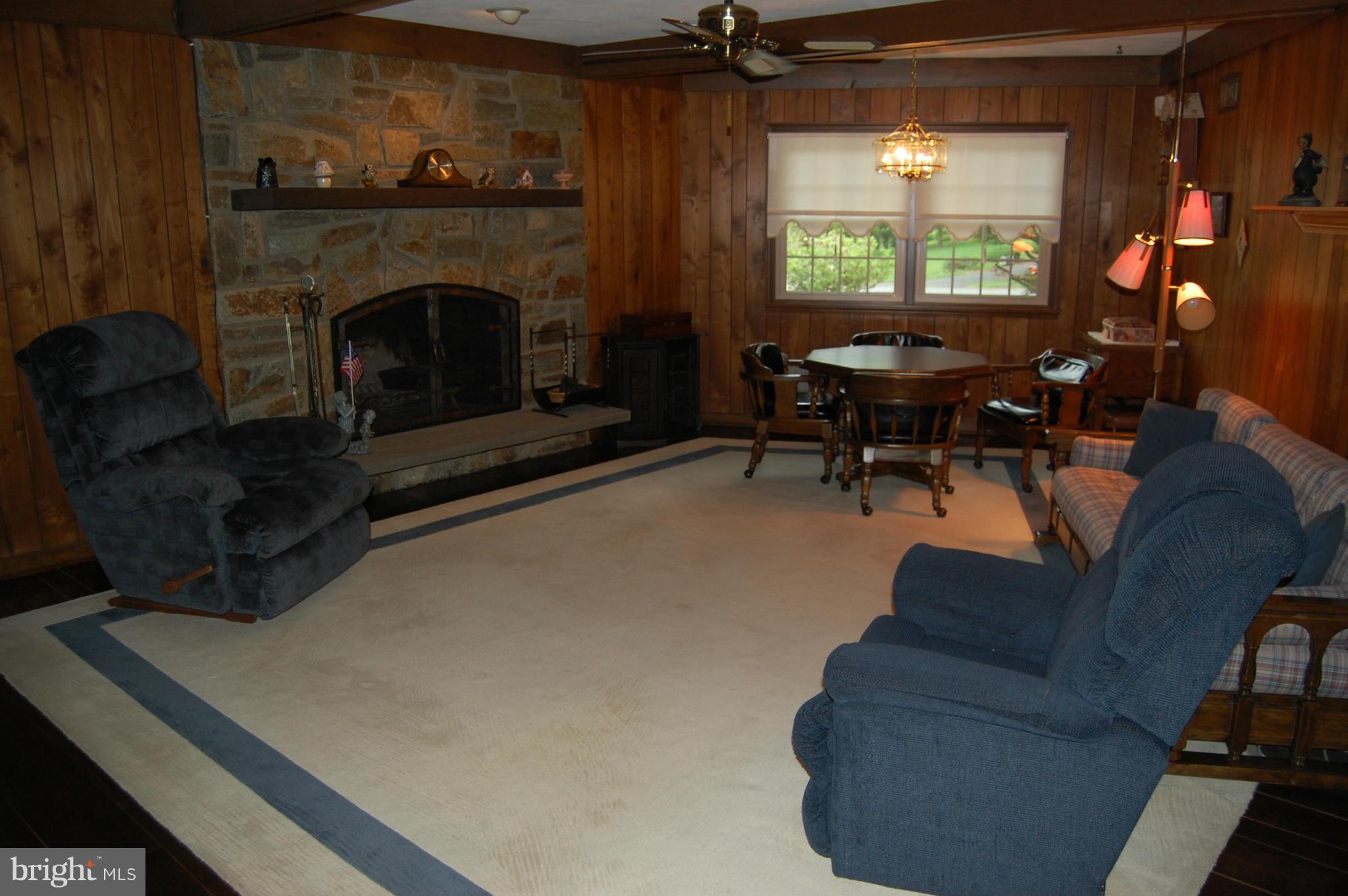 2209 Parallel Lane Silver Spring, MD 20904 - Photo 4 of 30 a living room with furniture and a fireplace