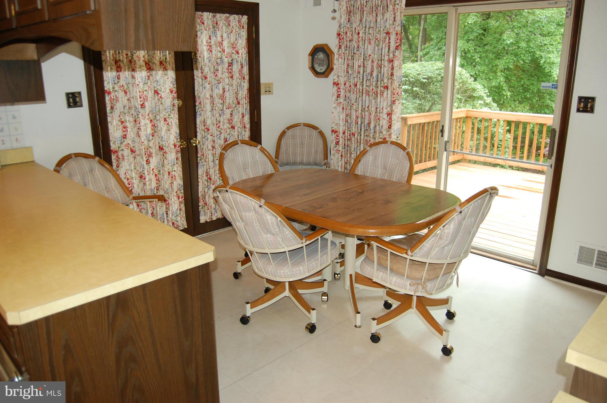 2209 Parallel Lane Silver Spring, MD 20904 - Photo 6 of 30 a dining room with furniture and wooden floor