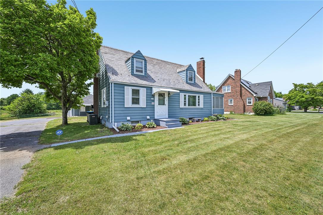 4065 Airport Road Allentown, PA 18109 - Photo 1 of 28 A charming blue home with dormer windows and a well-maintained lawn welcomes you.