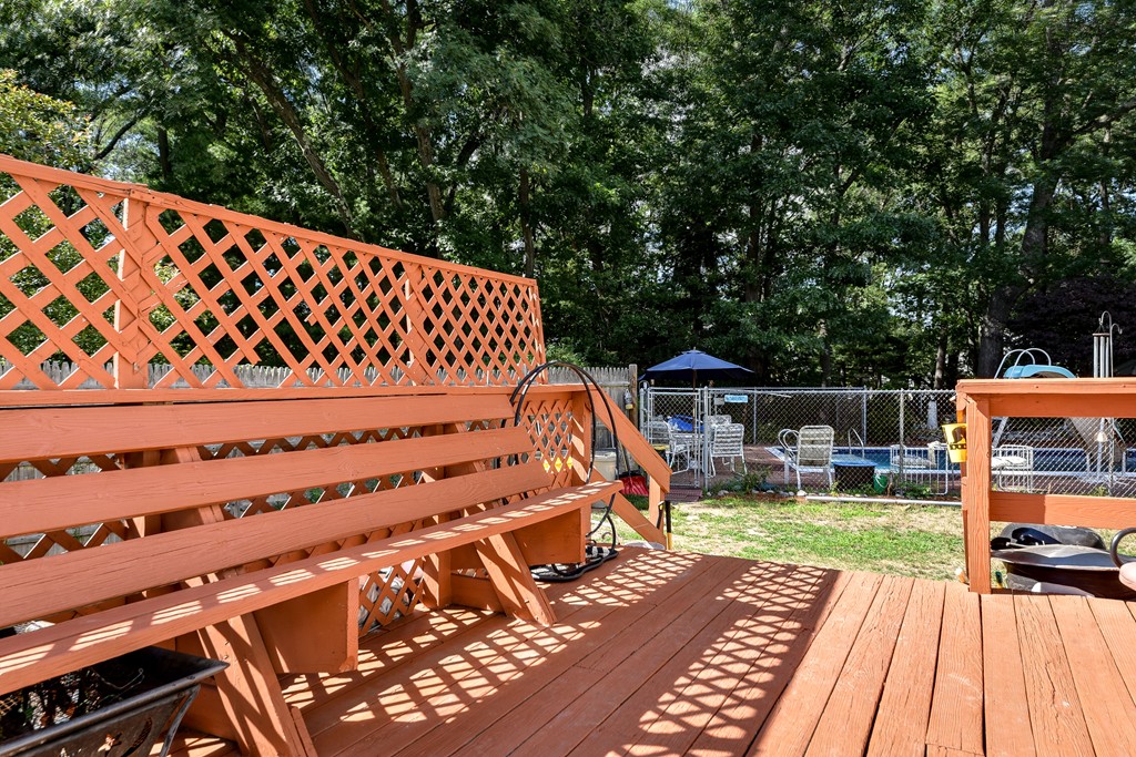 259 Potter Road Framingham, MA 01701 - Photo 19 of 23 a balcony with wooden floor and outdoor space