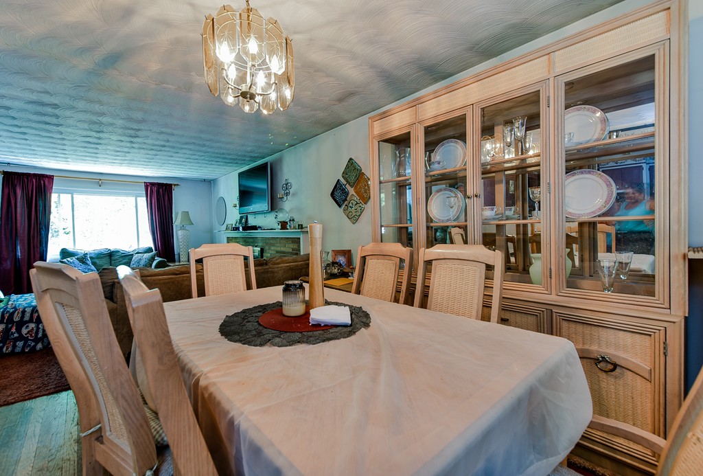 259 Potter Road Framingham, MA 01701 - Photo 4 of 23 a front view of a dining room with furniture