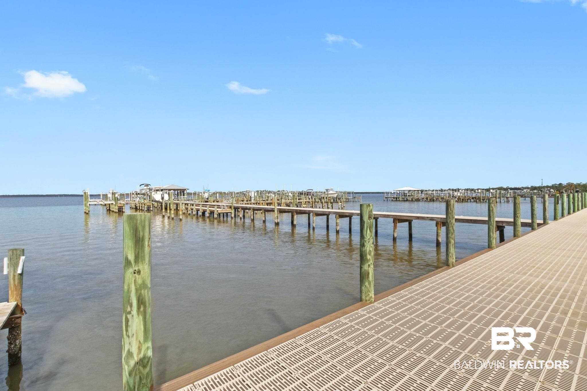 25861 Canal Road, Unit 78 Orange Beach, AL 36561 - Photo 37 of 45 View of dock with a water view