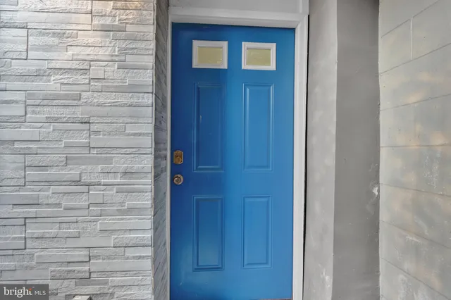 a brick wall with a door