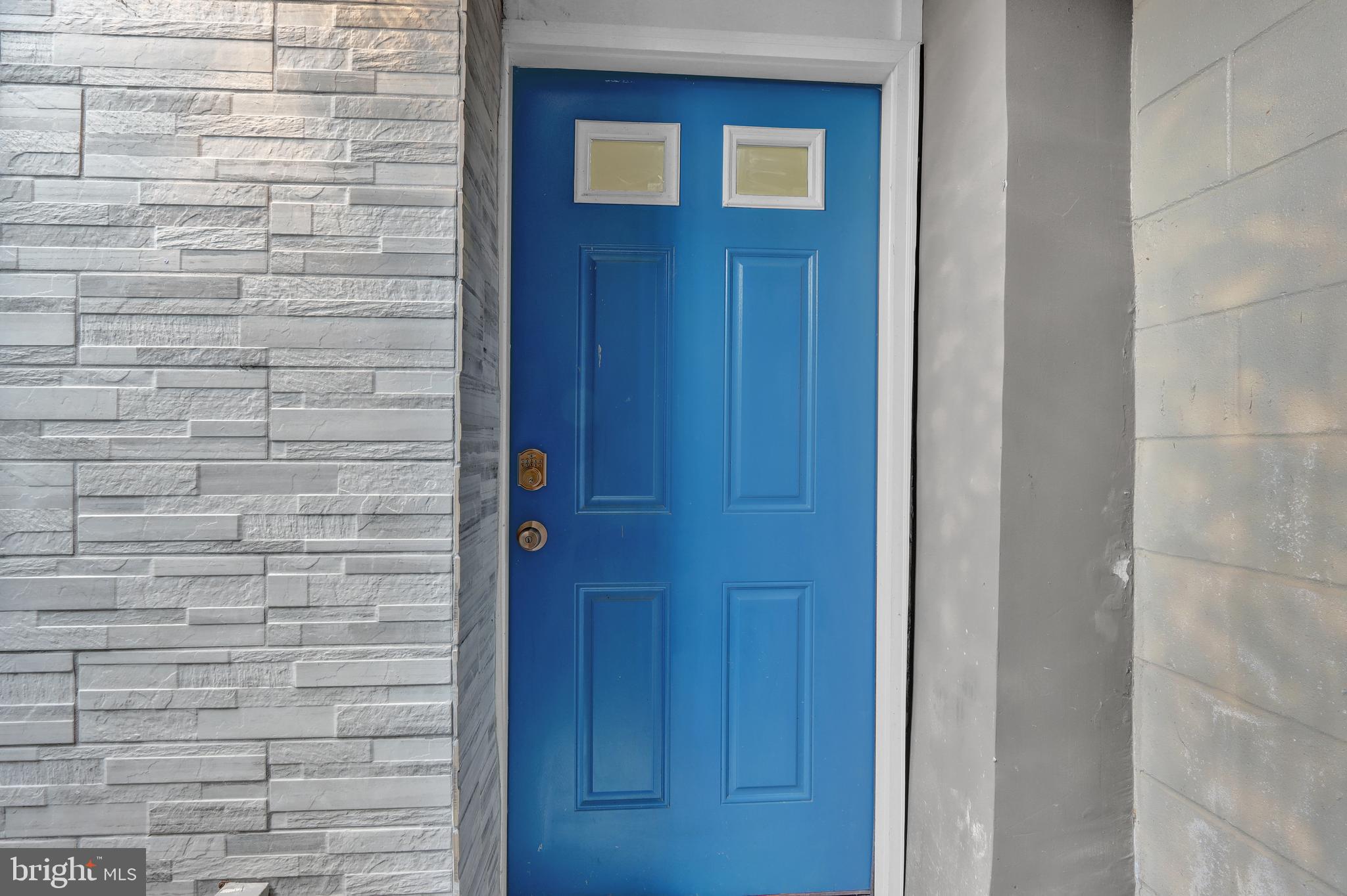 1167 Morse Street Northeast, Unit B1 Washington, DC 20002 - Photo 1 of 18 a brick wall with a door