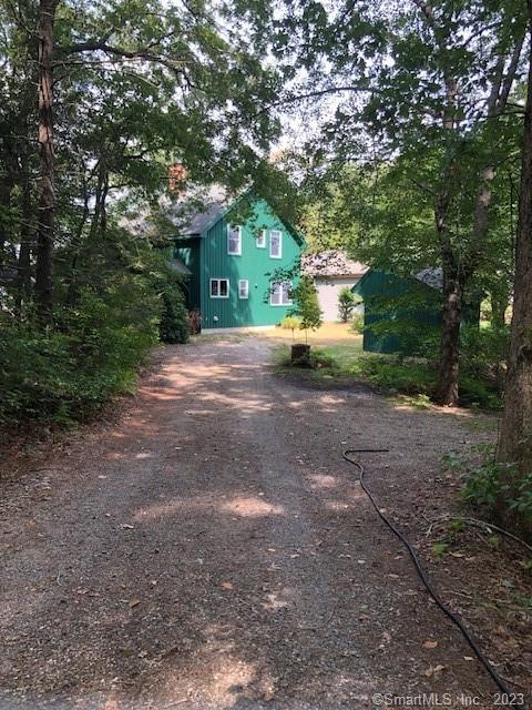 49 Sawmill Road Killingly, CT 06241 - Photo 1 of 1 a view of a house with large tree and a yard