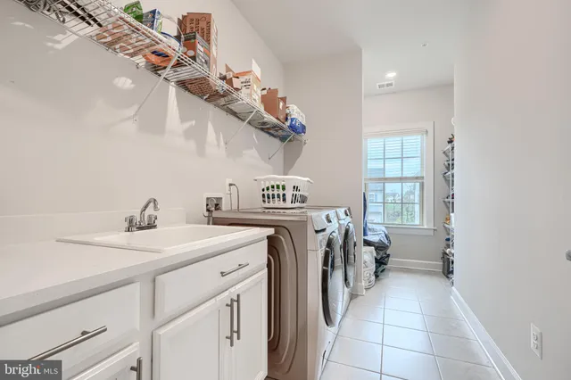 an empty room with a empty space and windows