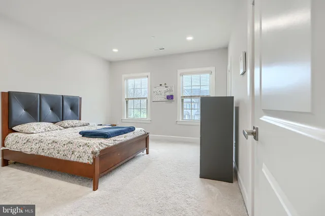 a view of an empty room with stairs