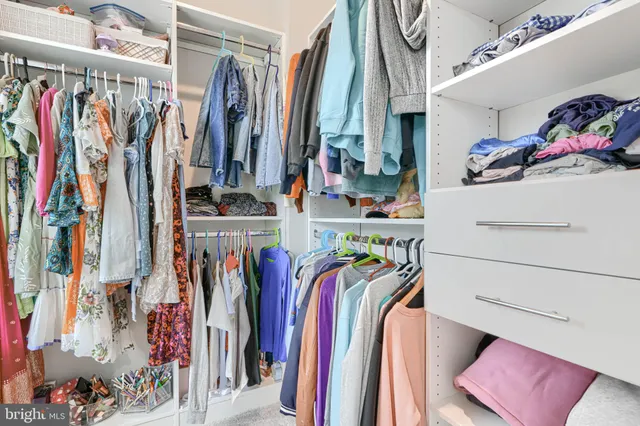 a view of house with backyard and pool