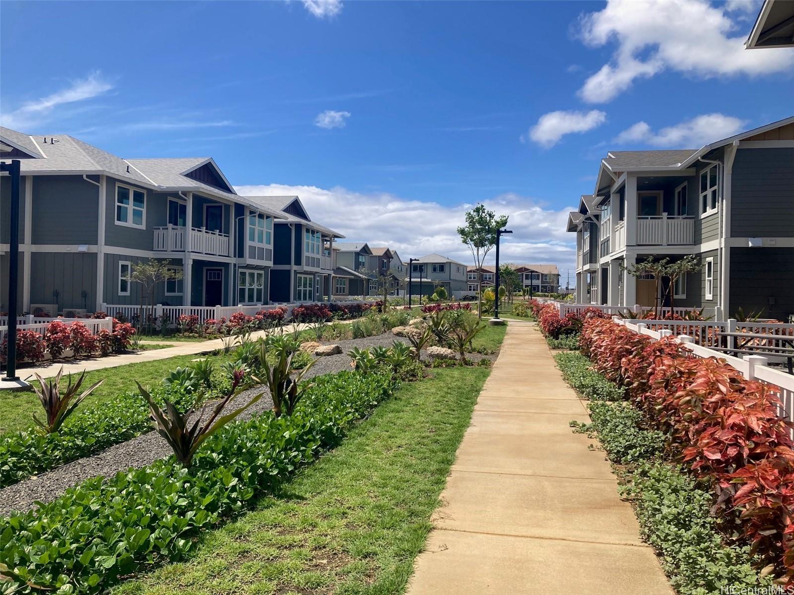 91-1101 Franklin D Roosevelt Avenue, Unit 363 Kapolei, HI 96707 - Photo 15 of 21 a view of a street with houses on both side