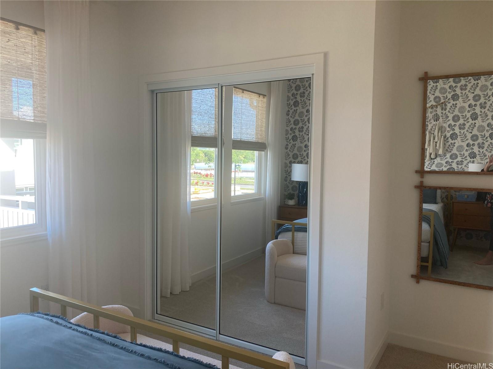 91-1101 Franklin D Roosevelt Avenue, Unit 363 Kapolei, HI 96707 - Photo 8 of 21 a bathroom with a toilet and a shower