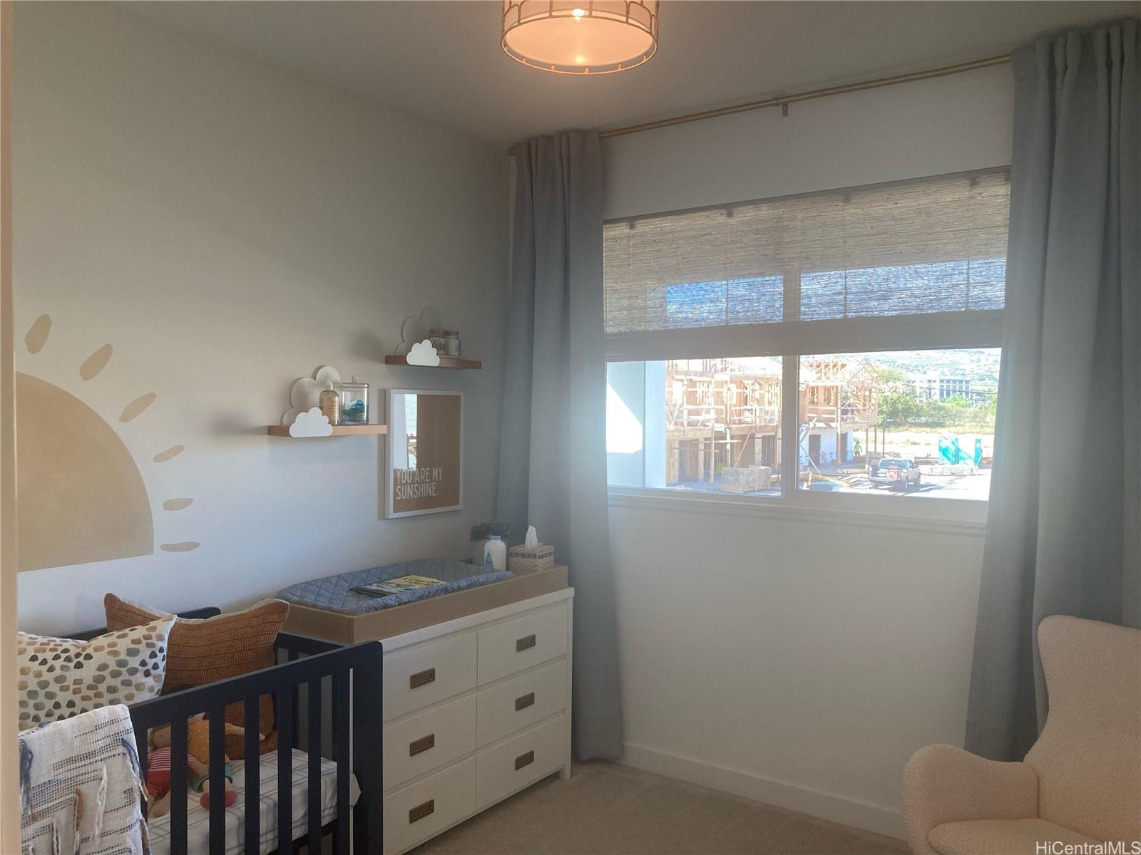 91-1101 Franklin D Roosevelt Avenue, Unit 363 Kapolei, HI 96707 - Photo 10 of 21 a bedroom with a bed and a window