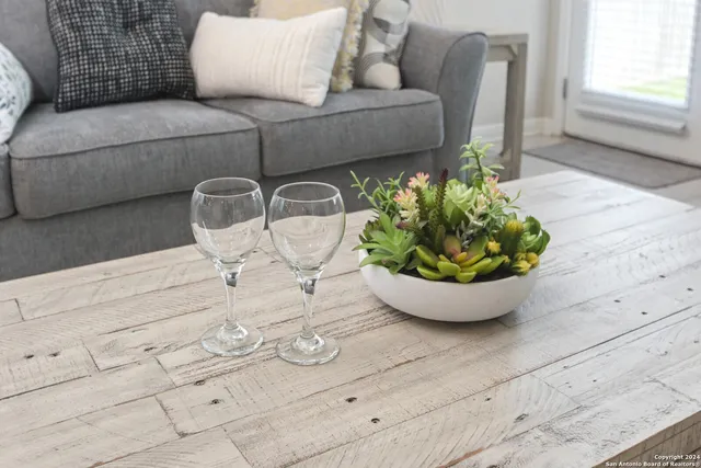 a view of table and chair in wooden floor