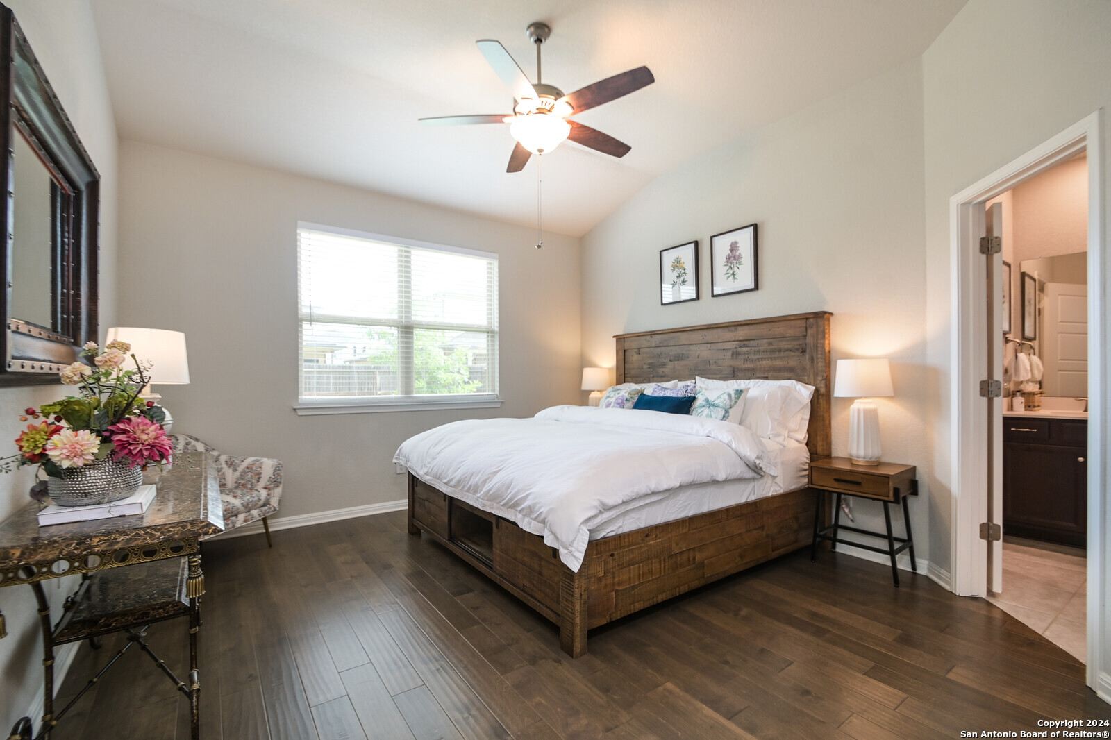 2411 Verona Way San Antonio, TX 78259 - Photo 15 of 22 a bed sitting in a bedroom next to a window