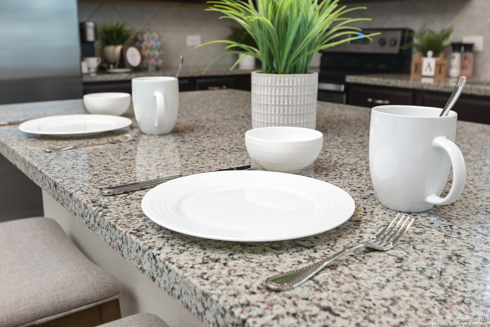 2411 Verona Way San Antonio, TX 78259 - Photo 3 of 22 a bathroom with a granite countertop sink and a mirror