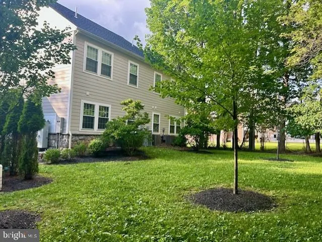 a house view with a garden space